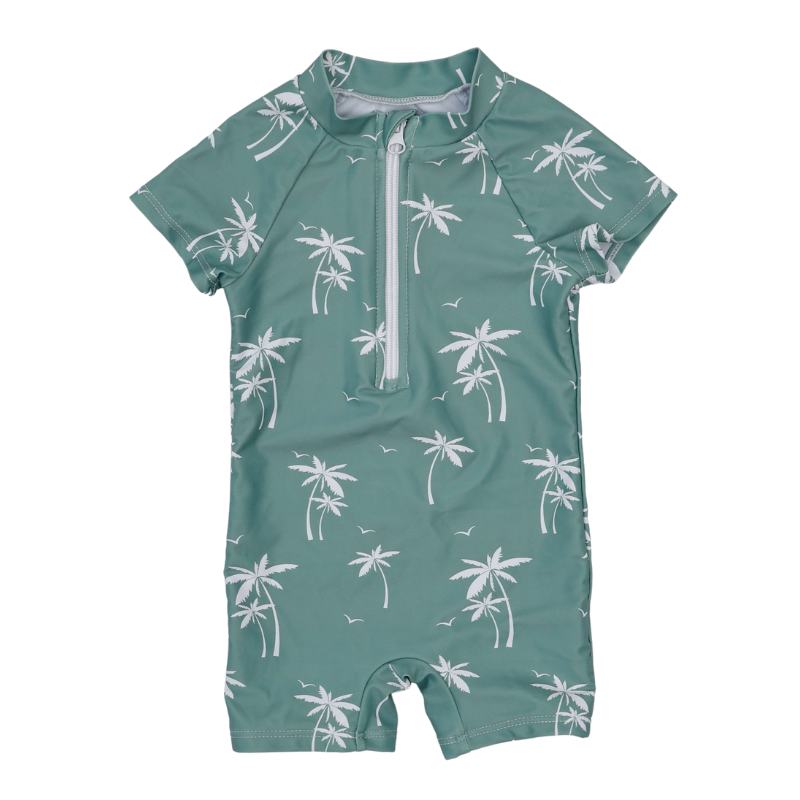 Vaikiškas vientisas žalias maudymosi kostiumėlis su baltais palmių raštais